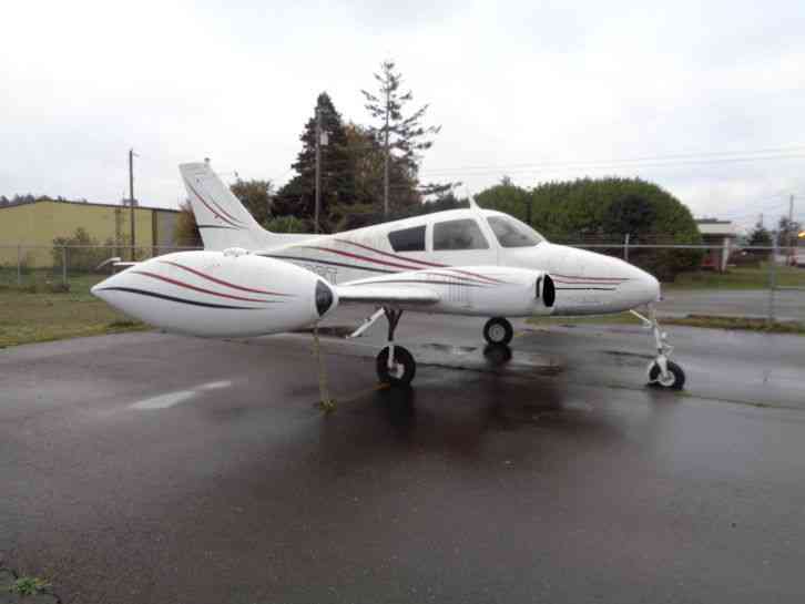 1960 CESSNA 310, 5400TT EXPOSED SOME TO HEAT ON 1 SIDE, NO ACCIDENT DAMAGE,CHEAP