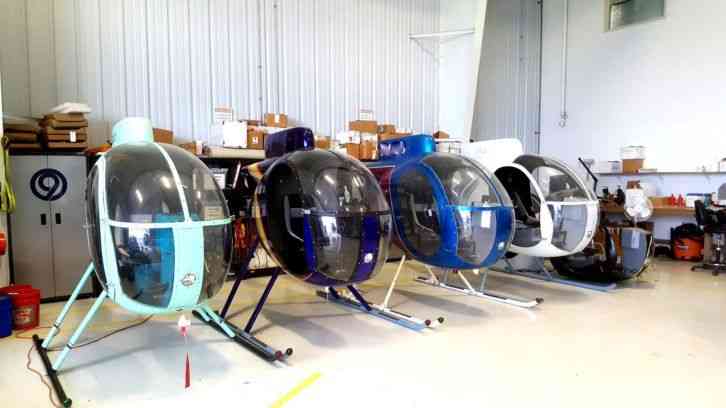 7 Revolution Mini 500 Helicopters with extra parts and 50 Main rotor blades